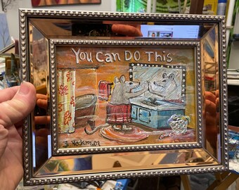 May include: A framed painting of two mice in a bathroom setting. The mice are looking at each other in a mirror. The painting has the words "You Can Do This" written on it. The painting is signed "B. Heckman".