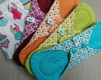 Washable and reusable sanitary napkins.