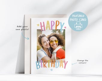 May include: A white photo card with the words "HAPPY BIRTHDAY" in colorful letters. The card features a photo of two smiling people hugging. Text on the card says "Add your own photo!" and "Change the colours!"