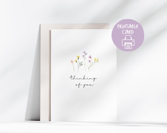 Puede incluir: Tarjeta imprimible con una ilustración de acuarela de flores y el texto "thinking of you".