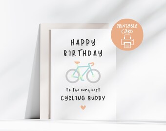 Puede incluir: Tarjeta de cumpleaños imprimible con una ilustración de una bicicleta azul y el texto "Feliz cumpleaños al mejor amigo ciclista".