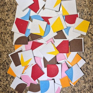 Large 3x3 felt, magnetic puzzle tiles. Fun for toddler to grade school levels. Colorful and sturdy. All layers are sewn, includes felt case.