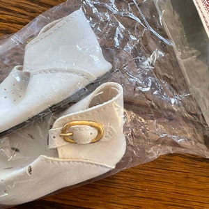 Size 4 doll shoes white or red high back with cutouts in front.