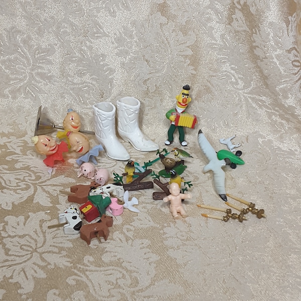Vintage lot of odds and ends of plastic cake decorations