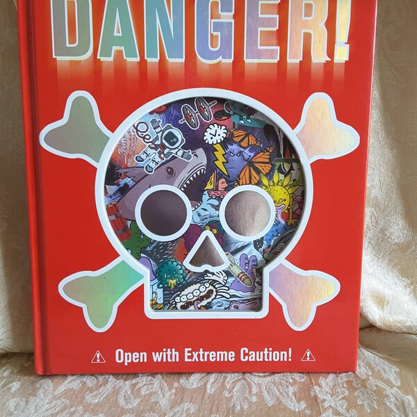 DANGER!  by laura butler Susan Kennedy, Jim Pipe and Richard Walker first edition Hardcover Book