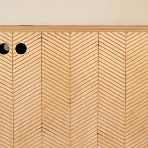 Detail view of a modern sideboard door