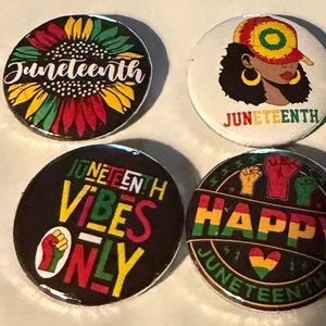 May include: Four round Juneteenth buttons with various designs. One features a sunflower with the word "Juneteenth". Another shows a woman wearing a hat. The third says "Vibes Only". The last says "Happy Juneteenth".