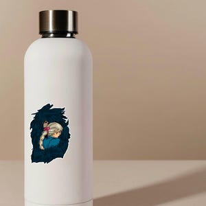 May include: White insulated water bottle with a silver lid. A sticker of a cartoon girl with blonde hair and a pink bow is on the bottle. The girl is wearing a blue top and is surrounded by a dark blue, stylized illustration.