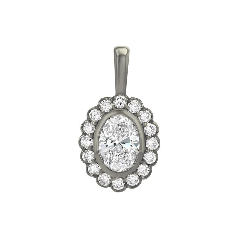 May include: A dark gray metal pendant featuring a central oval-cut clear gemstone surrounded by a halo of sixteen small round-cut clear gemstones. The pendant includes a vertical bail at the top for attachment to a chain or necklace.