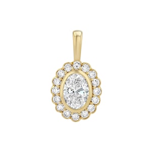 May include: A yellow gold pendant featuring a central oval-cut clear gemstone surrounded by a halo of sixteen small round-cut clear gemstones. The pendant includes a smooth, tapered gold bail at the top for attachment to a chain or necklace.