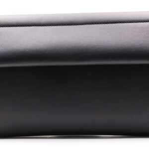 May include: A black leather clutch bag with a folded flap. The bag has a rectangular shape and a red patterned interior. The edges are neatly stitched, and the design is minimalist and modern.