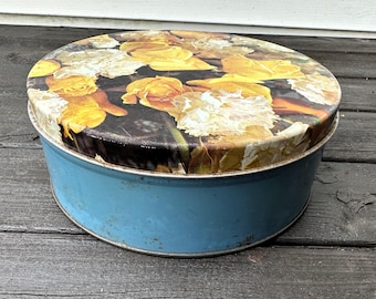 Vintage Floral Tin: Blue Round Storage Container with Lid