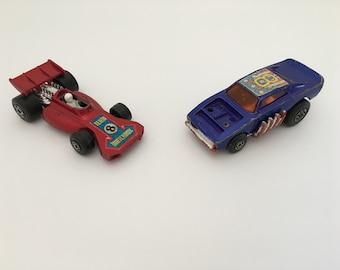 2 1970&#39;s Matchbox Superfast Race Cars:  1973 No. 24 Team Matchbox Red Race Car, 1972 No. 48 Pi-Eyed Piper Blue Race Car Vintage Matchbook