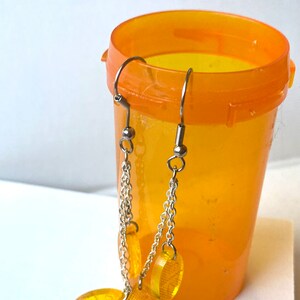 Chain dangle pill earrings