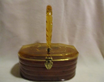 Unusual 1940's Brown and Gold Plastic Oval Box Purse.