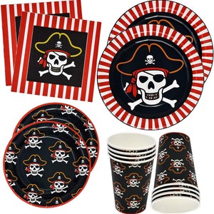 May include: A set of pirate-themed party supplies, including red and white striped paper plates, black and red paper cups with a skull and crossbones design, and black paper plates with a skull and crossbones design.