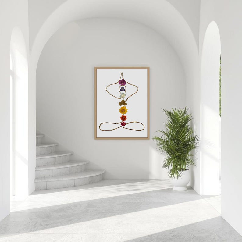 May include: A framed rectangular wall art piece featuring a stylized human figure in a seated meditation pose. The figure is outlined with thin brown twigs, and a vertical column of seven colorful pressed flowers runs along the center.