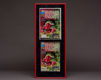 May include: Two framed comic book covers featuring Wolverine. The covers are red and black with the title "Wolverine" and the words "From the Depths...Stone Cold Death!"