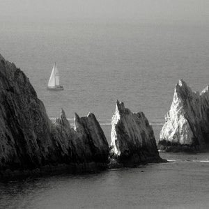 Sailing boat at The Needles, Isle of Wight, black and white