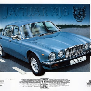 May include: A blue Jaguar XJ6 car with a silver grille and chrome bumpers. The car has a license plate that reads "XJ6 25". The car is parked on a road with white lines. The image is a commemorative poster for the 25th anniversary of the Jaguar XJ6.