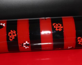 Red and Black Ladybug 16oz tumbler with red and white ladybugs