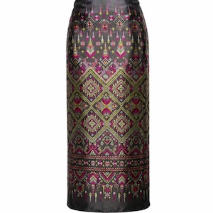 May include: A high-waisted, ankle-length skirt featuring a dark charcoal base with an intricate, repeating geometric pattern in shades of magenta, lime green, and white. The design includes diamond shapes and horizontal bands of detailed embroidery.