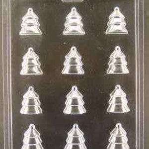 May include: A clear plastic mold for making chocolate Christmas tree shapes. The mold has 12 cavities, each shaped like a three-tiered Christmas tree.