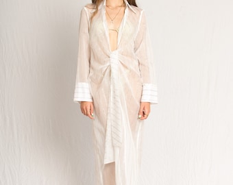 Long sheer shirt cover up with a front-tie waistband and loose fit