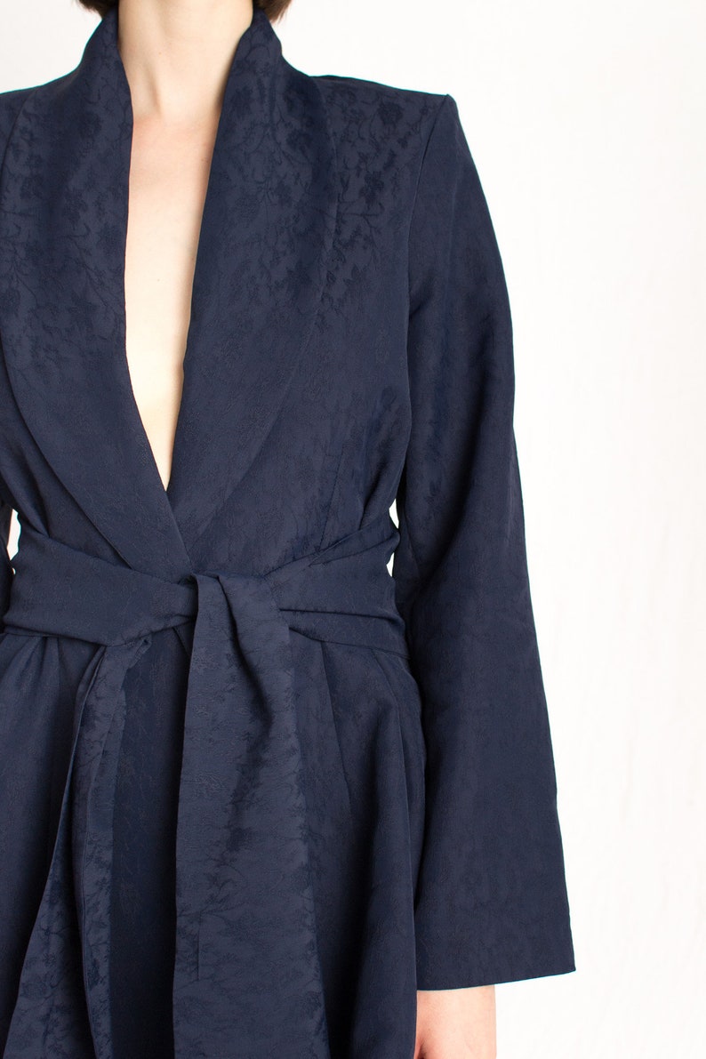 navy blue patterned relaxed fit blazer with wrap around belt