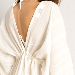 White caftan maxi beach dress with V neckline and middle slit