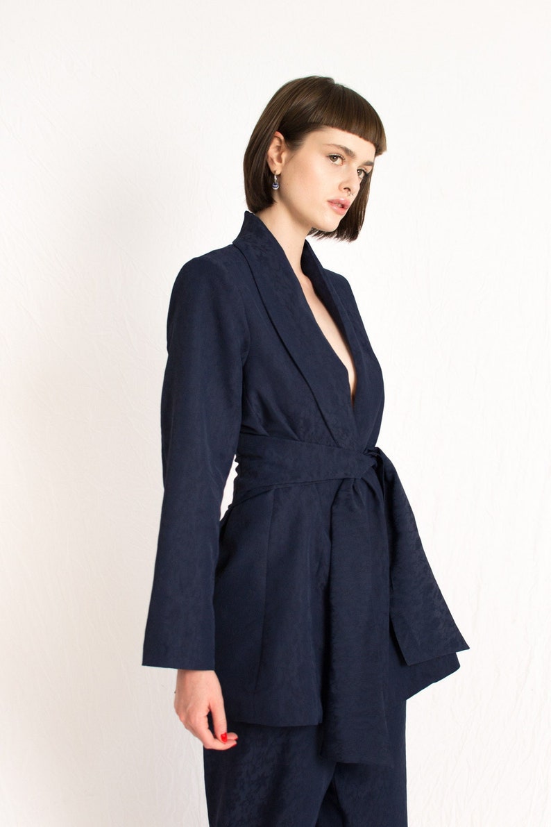 navy blue patterned relaxed fit blazer with wrap around belt