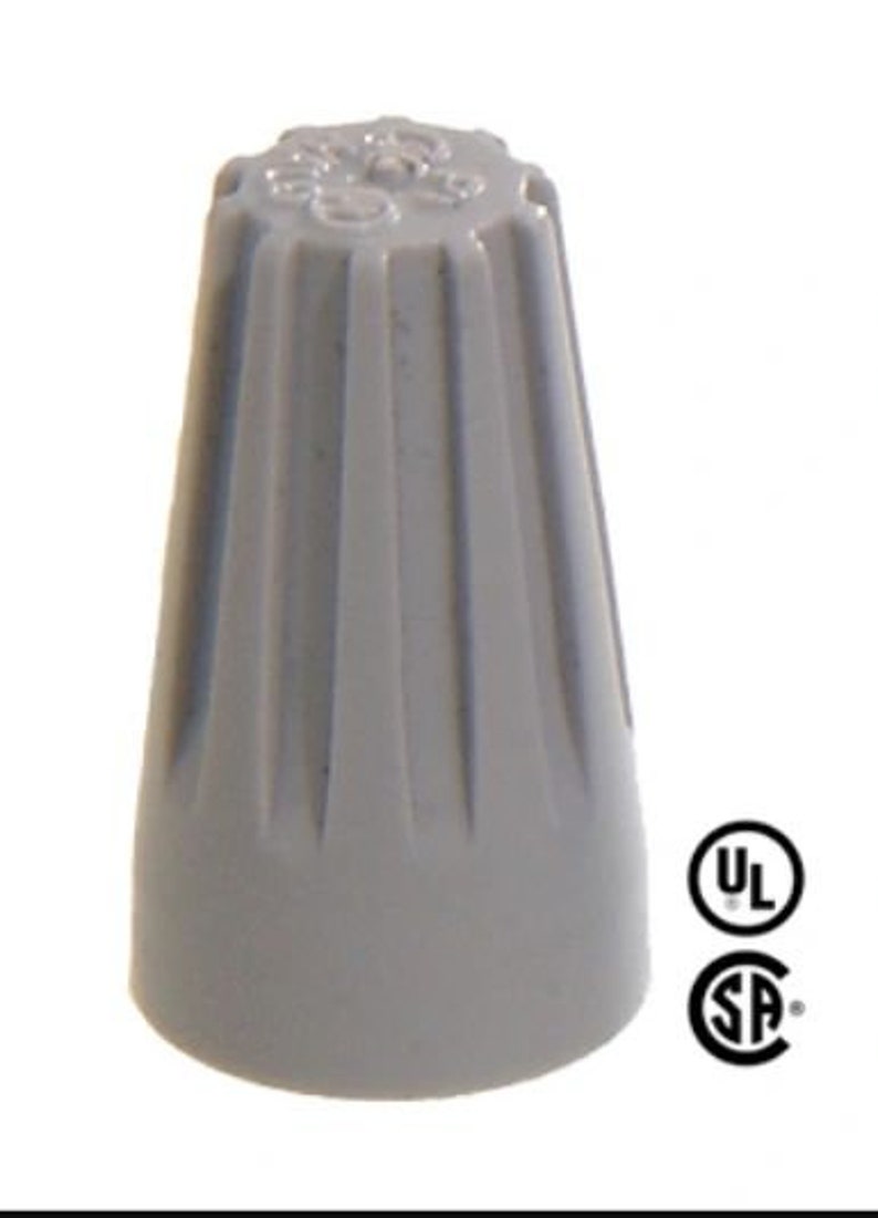 May include: A gray wire connector with a ribbed design and UL and CSA markings.