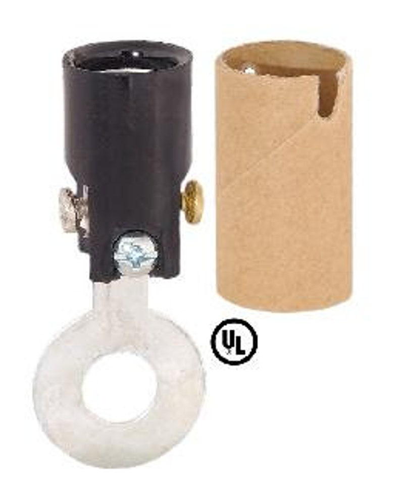May include: Black electrical socket with a side-mounted wire connector and a cardboard extension tube. The socket is UL certified.