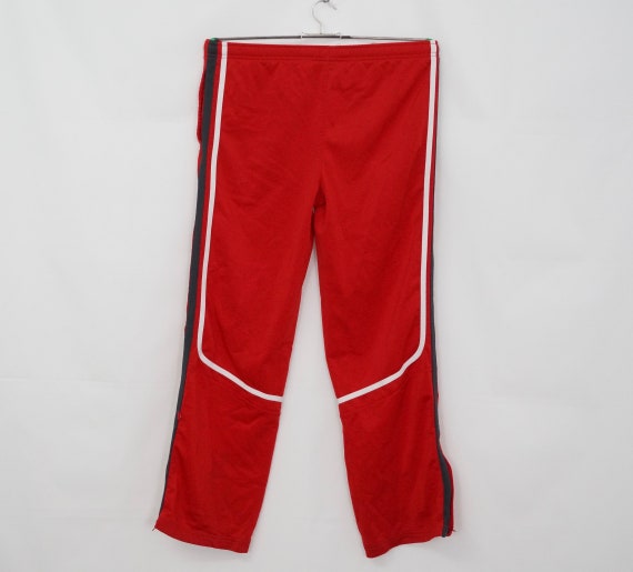 Nike tracksuit bottoms age cheap 13