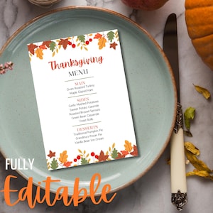 May include: Printable Thanksgiving menu template with a fall leaf border. The menu includes a list of dishes for a Thanksgiving dinner, including oven roasted turkey, maple glazed ham, garlic mashed potatoes, sweet potato casserole, roasted brussel sprouts, green bean casserole, yeast rolls, traditional pumpkin pie, grandma's pecan pie, and vanilla bean ice cream.