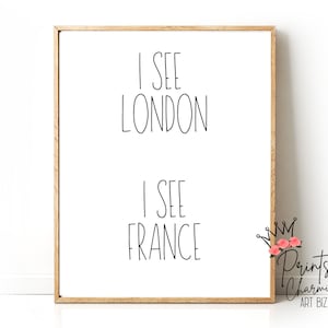 May include: A framed print with the text "I see London, I see France" in black font on a white background.