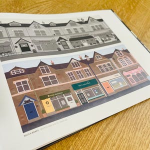 May include: A digital illustration of a row of colourful shop fronts with names like "Becca's Blossoms" and "The Cumberland". The illustration is in a cartoon style and features a variety of colours and details.