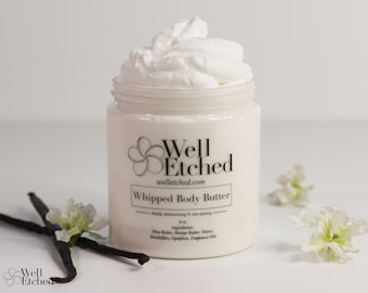 May include: A white jar of whipped body butter with a black label that reads "Well Etched" and "Whipped Body Butter". The label also lists the ingredients: Shea Butter, Mango Butter, Water, Emulsifiers, Optiphen, and Fragrance Oils.