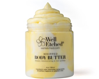 May include: A jar of whipped body butter with a yellow and white swirl design. The jar has a white label with the text "Well Etched" and "Whipped Body Butter". The jar contains 8 oz. / 236 ml of product.