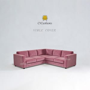 May include: A large, corner sofa in a dusty rose color. The sofa has a modern design with a low profile and plush cushions. The text "CYCushions" and "VIMLE COVER" are visible in the background.