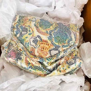 Hand clutch for party and ceremony, leather handbag, fantasy print, bright pastes colors with magnetic closure