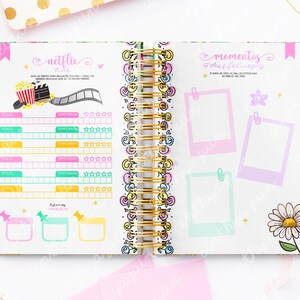 May include: Open notebook with a gold spiral binding, featuring colorful pages for planning. One page has a Netflix theme with a popcorn graphic and film strip. The other page has photo frames and a daisy.