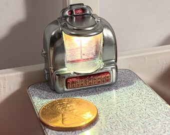 Miniature Seeburg table top Jukebox with working light