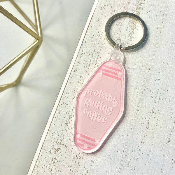 Probably getting coffee key chain, acrylic keychain, trendy keychain, key ring charm, pink key chain, cute keychain, vintage motel keychain