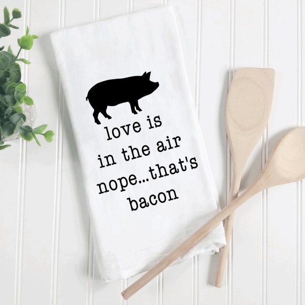 Love is in the air...nope that’s bacon! Funny kitchen towels, bacon gifts, funny kitchen towels, funny tea towels, funny bacon tea towels