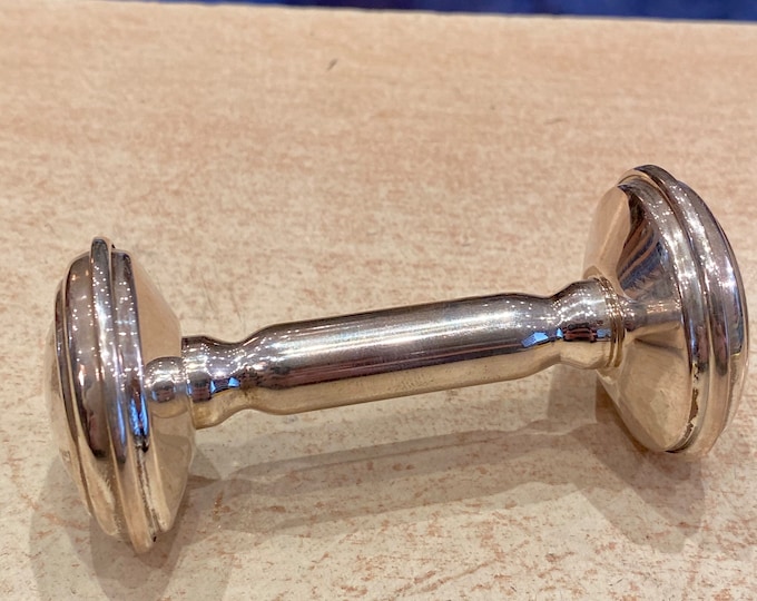 Sterling silver rattle in the shape of a dumbbell New