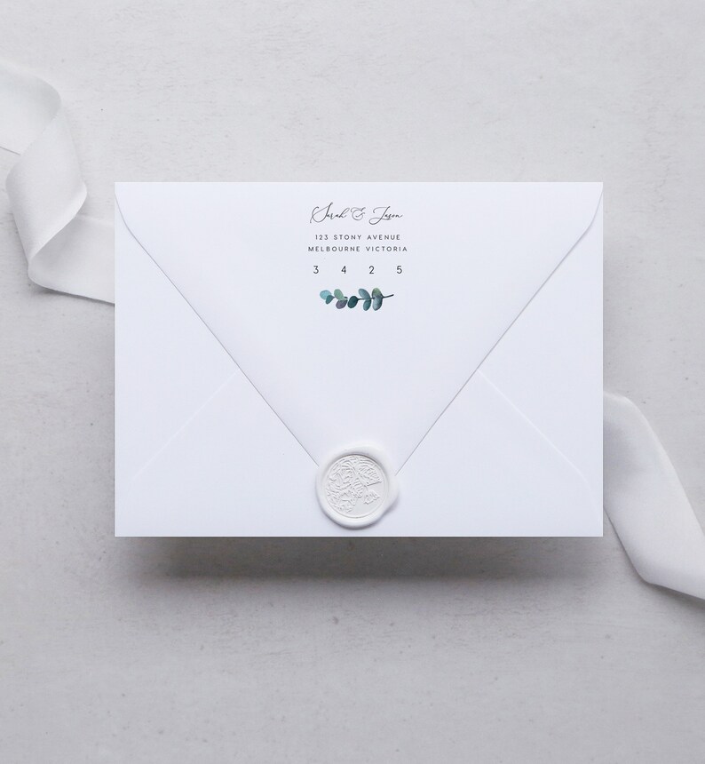 May include: White envelope with a wax seal and a handwritten address that reads "Sarah & Josh, 123 Stony Avenue, Melbourne Victoria, 3425" with a small sprig of eucalyptus leaves.