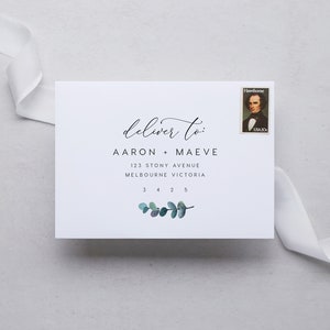 May include: A white envelope with a handwritten address that reads "deliver to: AARON + MAEVE 123 STONY AVENUE MELBOURNE VICTORIA 3 4 2 5". A small green floral design is below the address. A postage stamp with a portrait of a man is in the upper right corner.