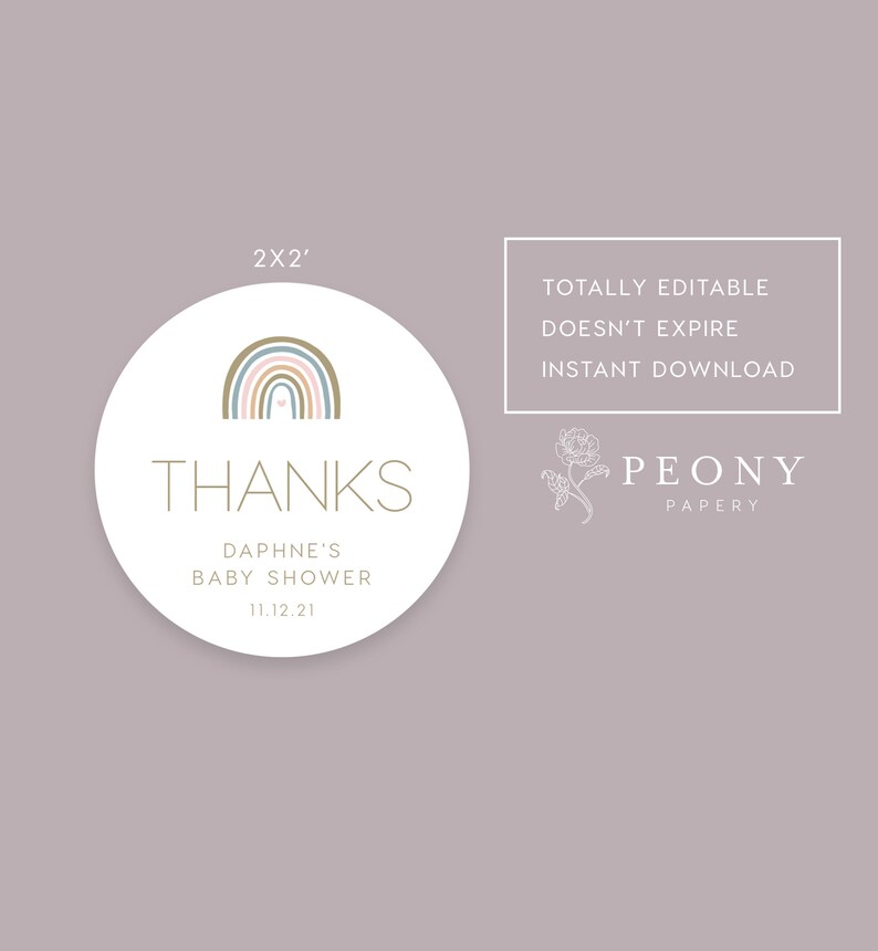 May include: A round, white sticker with a rainbow design in shades of brown, blue, and pink. The text "THANKS" is in gold lettering, followed by "DAPHNE'S BABY SHOWER 11.12.21". The sticker is 2 inches in diameter.