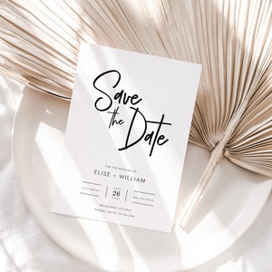 Op de afbeelding: Save the Date huwelijkskaart met een witte achtergrond en zwarte tekst. De kaart zegt "Save the Date" in een handschrift. De tekst eronder zegt "Voor de bruiloft van Elise + William" en bevat de datum "Zaterdag 26 augustus 2021" en de locatie "Melbourne, Victoria".